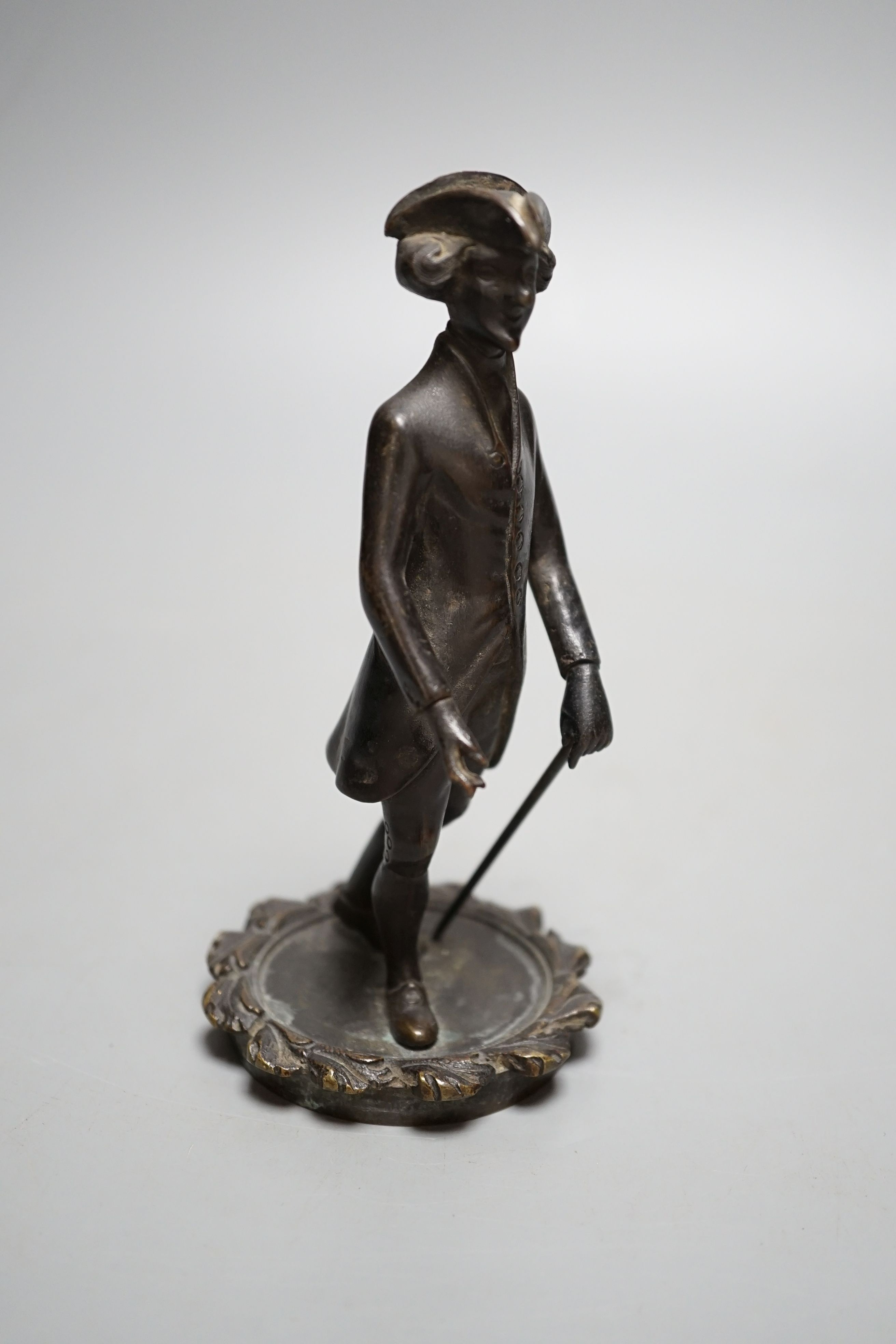 A Regency bronze tobacco box, surmounted by a figure of Dr. Syntax - 20cm tall